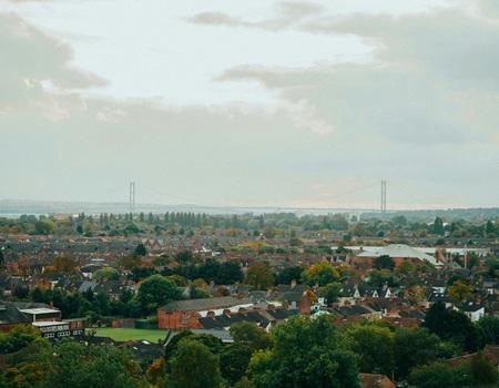 Aerial view of houses with Humber Bridge in the background